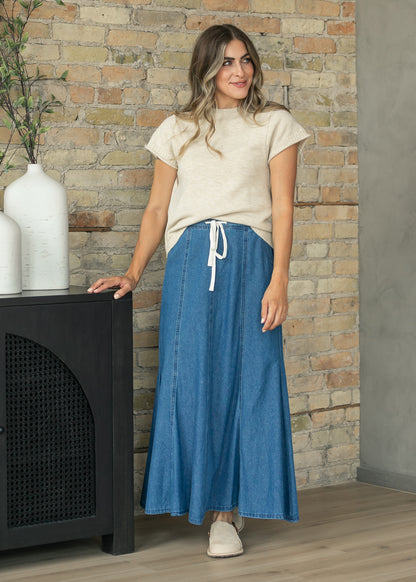 Stone crewneck sweater T-shirt paired with a blue denim maxi skirt for an easy everyday outfit.