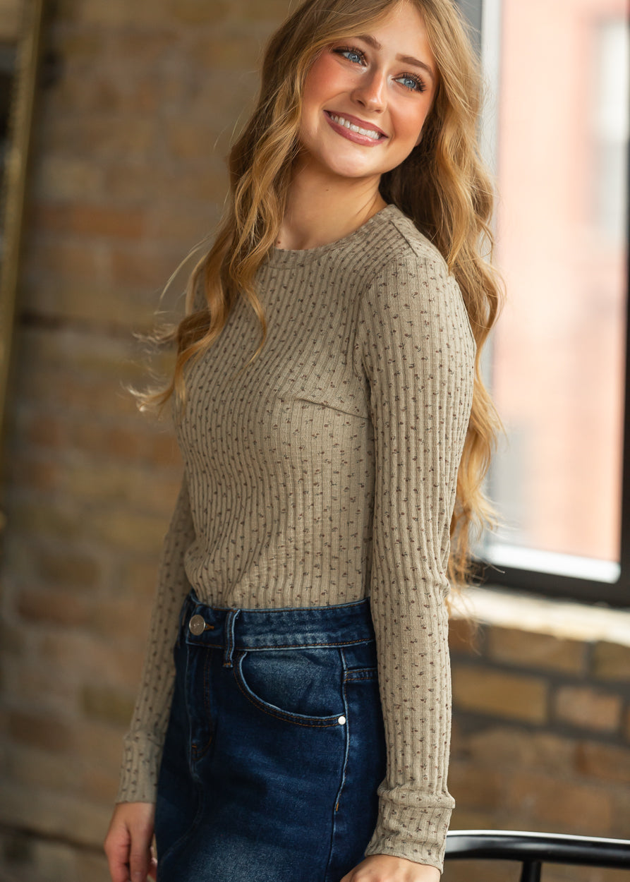 Fitted olive printed top with crew neckline and long sleeves