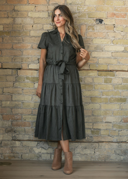 Olive suede midi dress with collared neckline, short sleeves, button front, and self-tie waist.