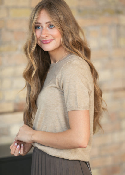 Taupe short sleeve sweater with soft knit texture, crew neckline, and ribbed sleeve trim.