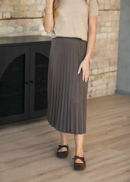 Cocoa brown pleated midi skirt with stretchy waistband, front view.
