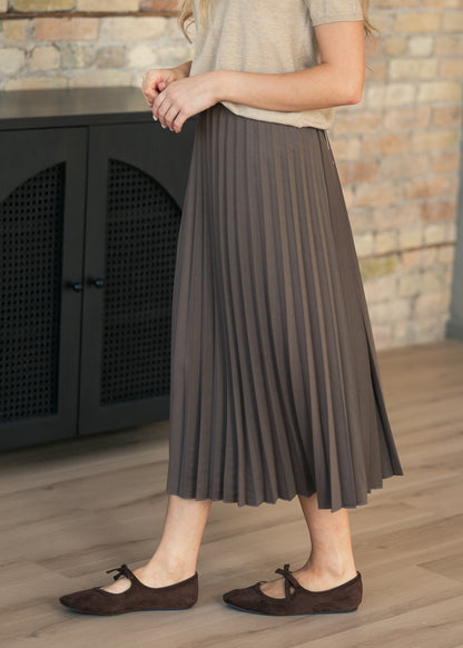 Cocoa pleated midi skirt lifestyle shot.