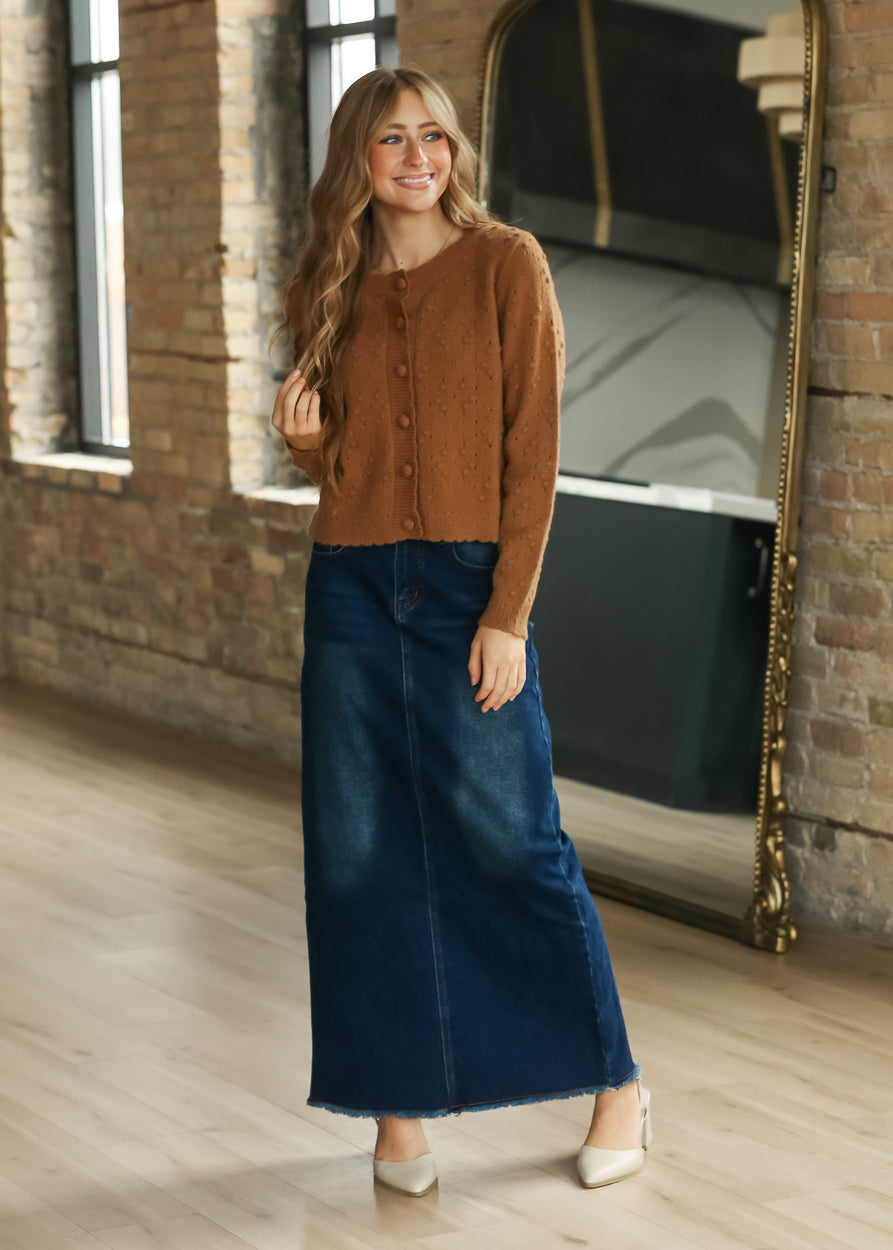 Camel bobble knit cardigan with functional tonal buttons, round neckline and scalloped hem.