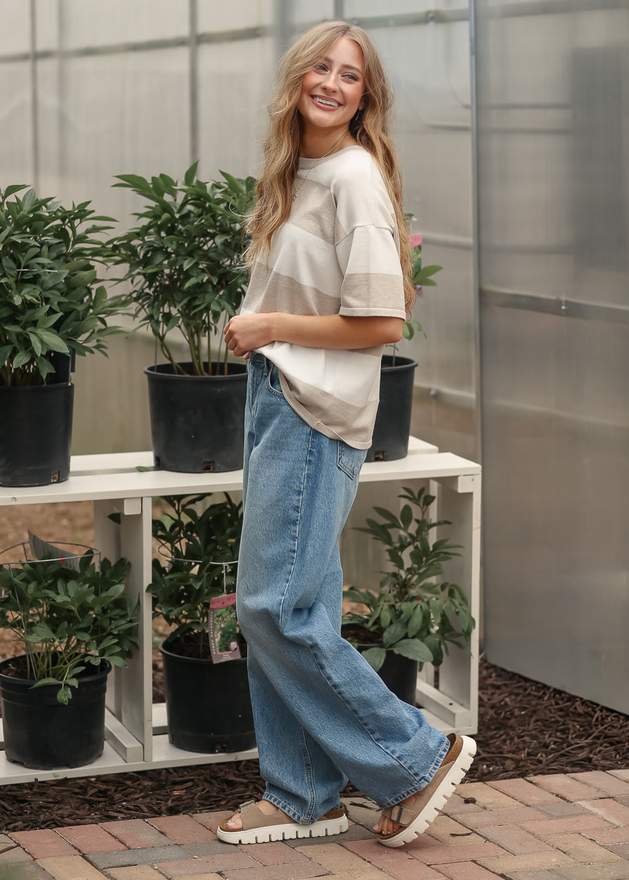 Full length view of neutral striped oversized t-shirt