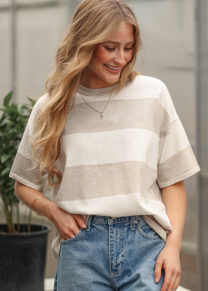 Front view of oversized striped t-shirt in neutral tones