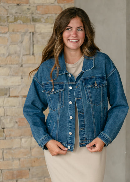 Rue medium wash denim jacket with relaxed fit, dropped shoulders, and classic button front.