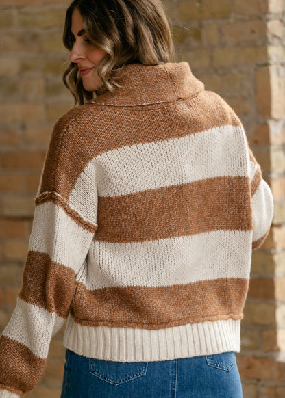 Back of chestnut and cream striped sweater showing wide stripes and oversized shawl collar.
