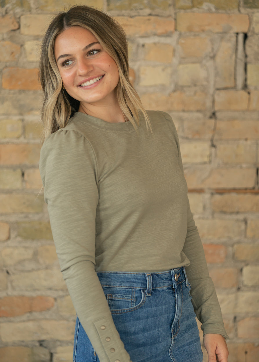 Sage fitted long sleeve top with crew neckline and softly gathered puff shoulders.