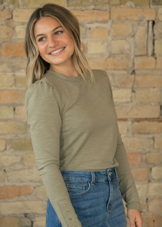 Sage fitted long sleeve top with crew neckline and softly gathered puff shoulders.