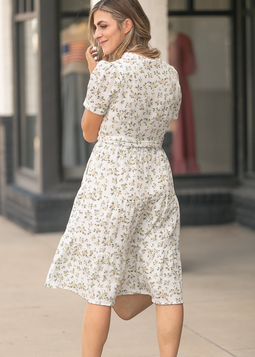 Floral tiered dress featuring a soft yellow and sage print