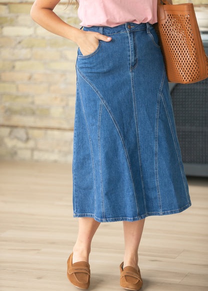 Medium wash denim midi skirt with flattering A-line silhouette and stitched panel design.