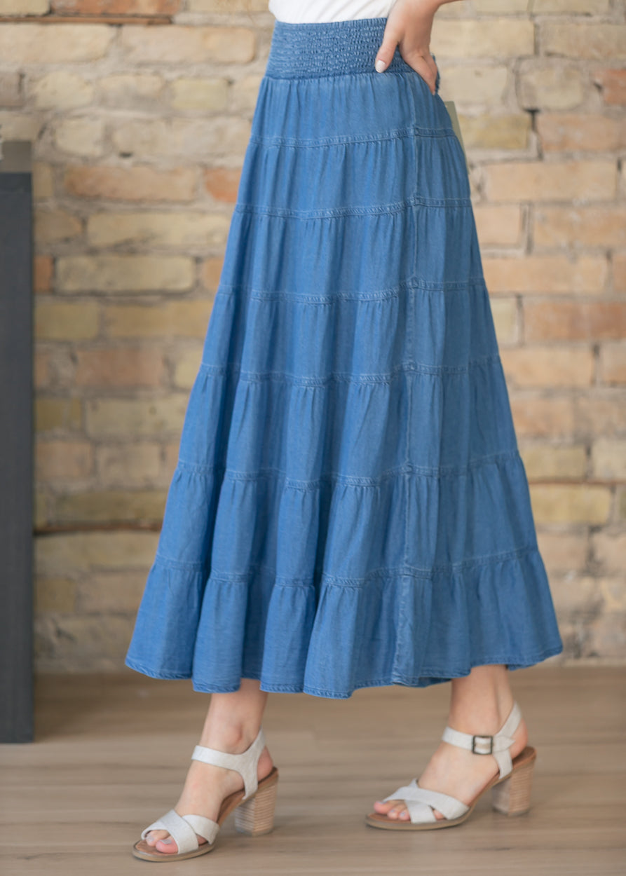 Tiered blue maxi skirt with soft drape and feminine movement