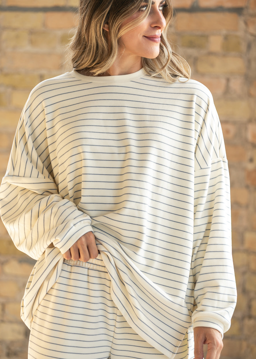 Ivory striped Ashton oversized top styled with matching wide leg pants in a coordinated set.