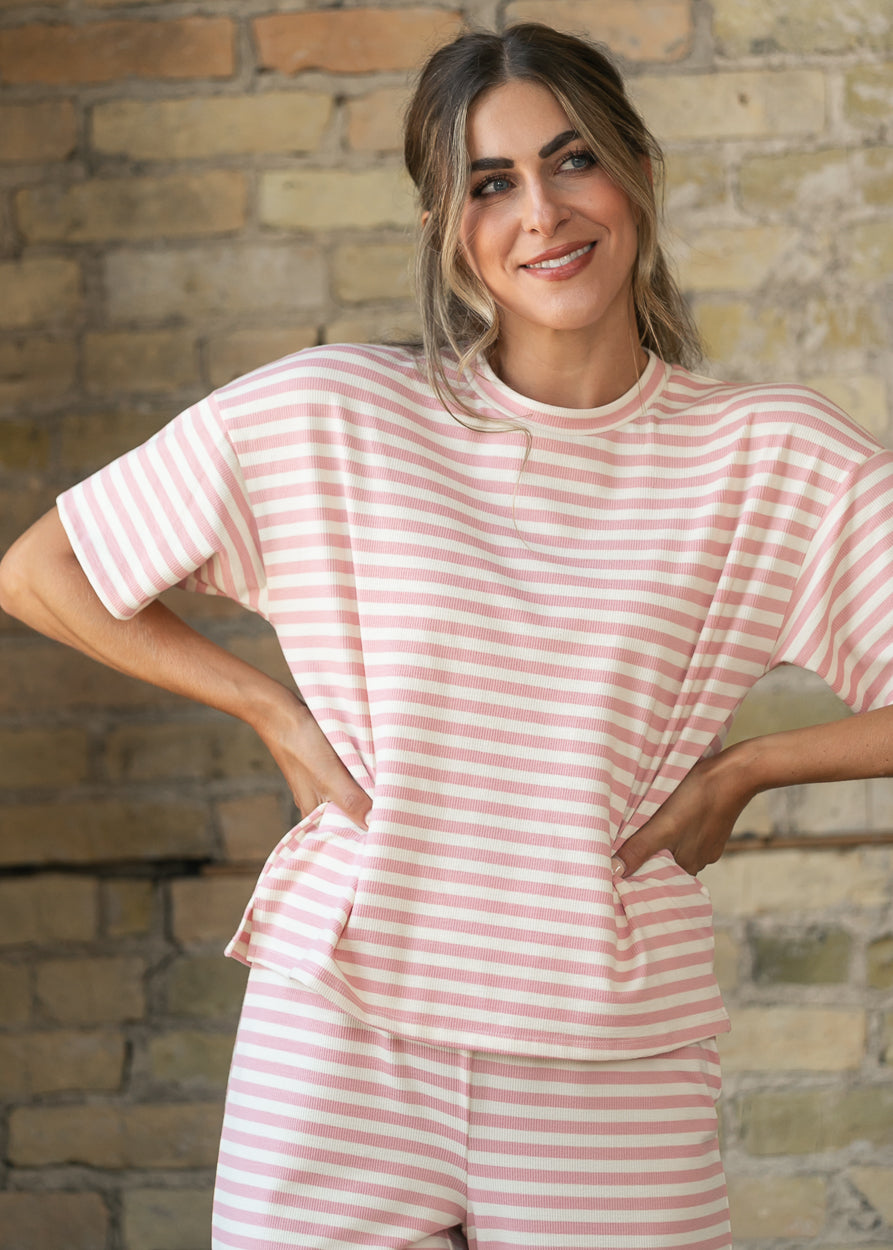 Pink striped Bailey tee styled with matching wide-leg striped pants.