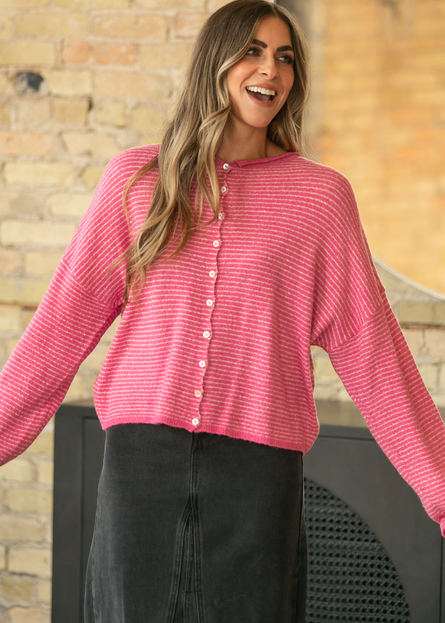 Things Between bubblegum pink Piper Cardigan with button front, relaxed fit, and long sleeves.