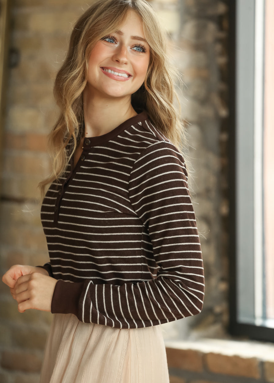 Brown striped long sleeve top with cream stripes and a relaxed loose fit.