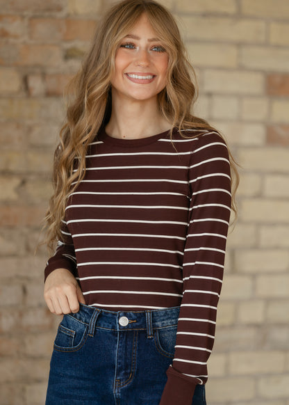 Chocolate brown Stacy Long Sleeve Top with ivory horizontal stripes, ribbed texture, and fitted sleeves.