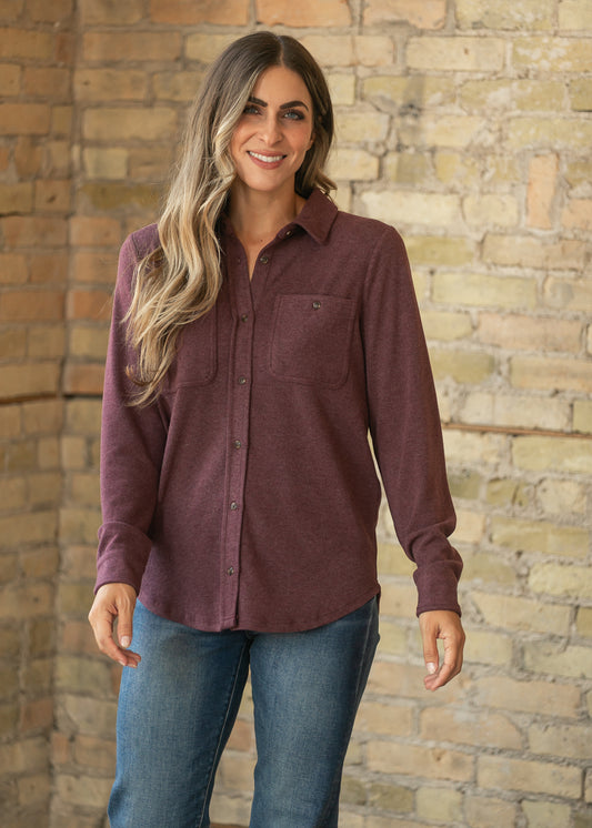 Burgundy Lewis long sleeve top with loose fit, button front, and chest pockets styled with denim.