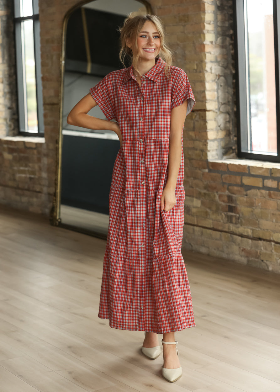 Red gingham shirt midi dress with tiered skirt and short sleeves, shown from the back.