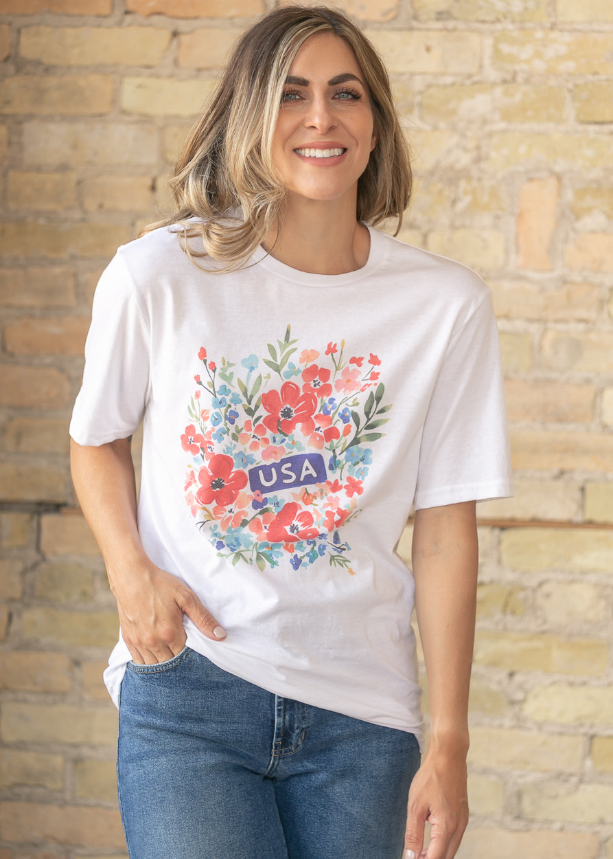 Casual floral graphic t-shirt styled with coral bottoms