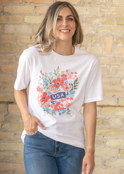Casual floral graphic t-shirt styled with coral bottoms