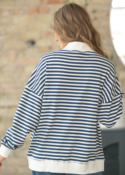 Back view of navy and ivory striped USA sweatshirt with oversized fit and ribbed hem