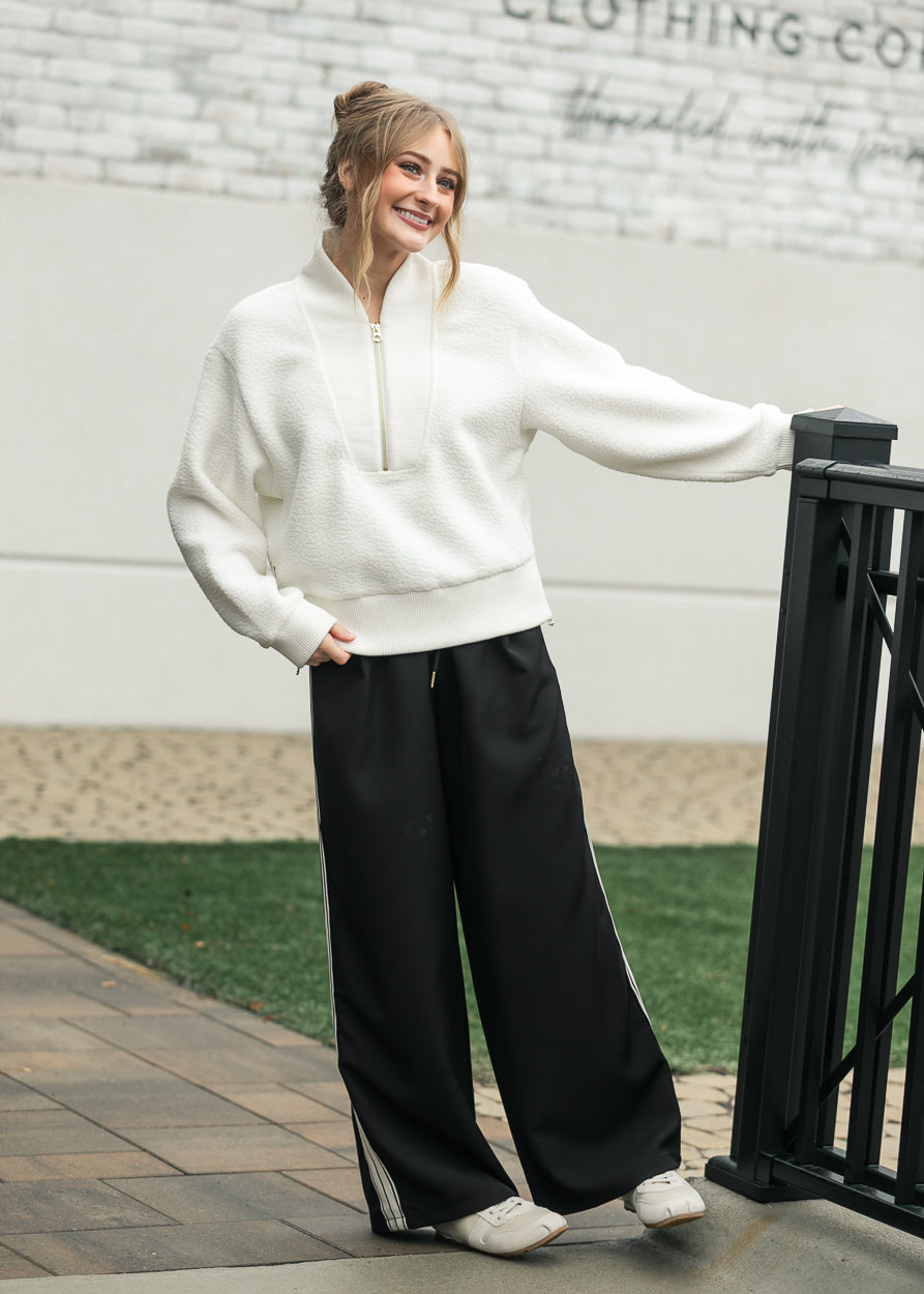 Cream Varley half zip fleece with relaxed fit and ribbed hem