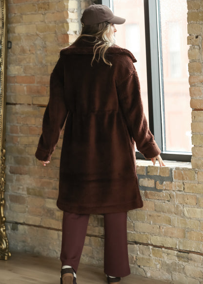 Back view of Varley Bennet mahogany sherpa coat showing the relaxed long silhouette.