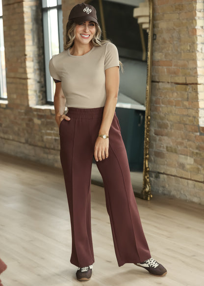 Varley Mahogany wide-leg pants styled with a fitted neutral short sleeve top