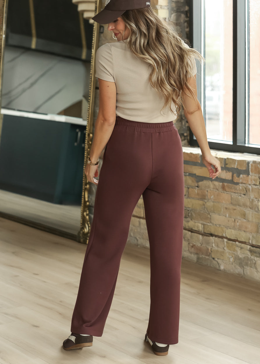 Back view of Mahogany wide-leg pants with a relaxed full-length silhouette