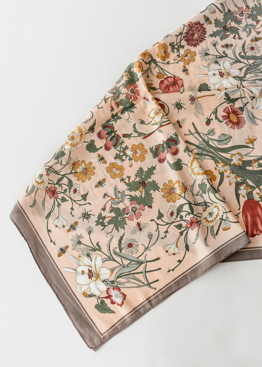 Vintage floral satin square scarf with botanical flowers, butterflies, and taupe border laid flat.
