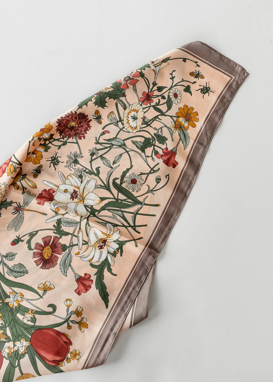 Botanical satin square scarf featuring blush background and detailed vintage-inspired floral print.