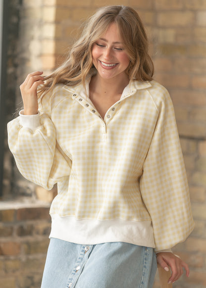PaperMoon yellow gingham pullover featuring a quarter snap neckline and balloon sleeves.