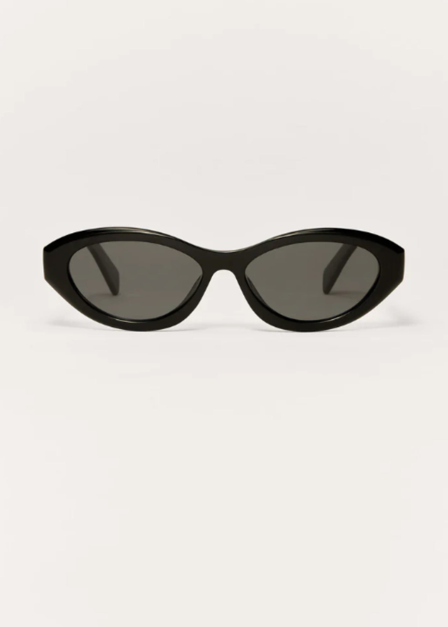 Front view of black Backstage polarized sunglasses with vintage-inspired oval shape.