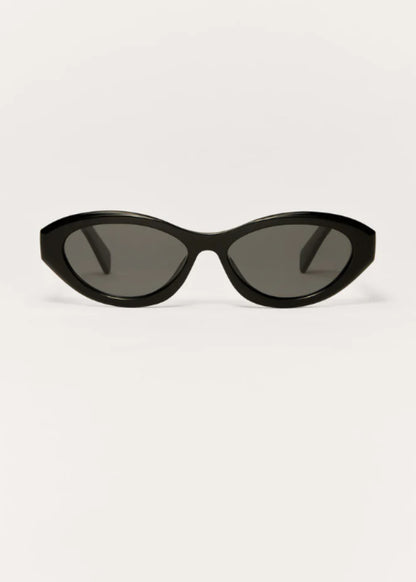 Front view of black Backstage polarized sunglasses with vintage-inspired oval shape.