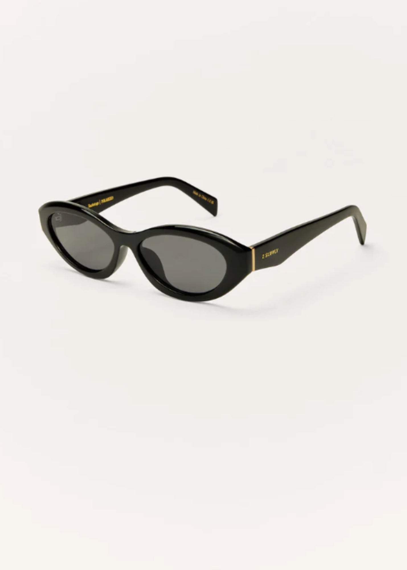 Black oval polarized sunglasses with dark lenses and slim tapered arms.