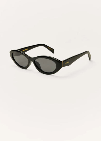 Black oval polarized sunglasses with dark lenses and slim tapered arms.