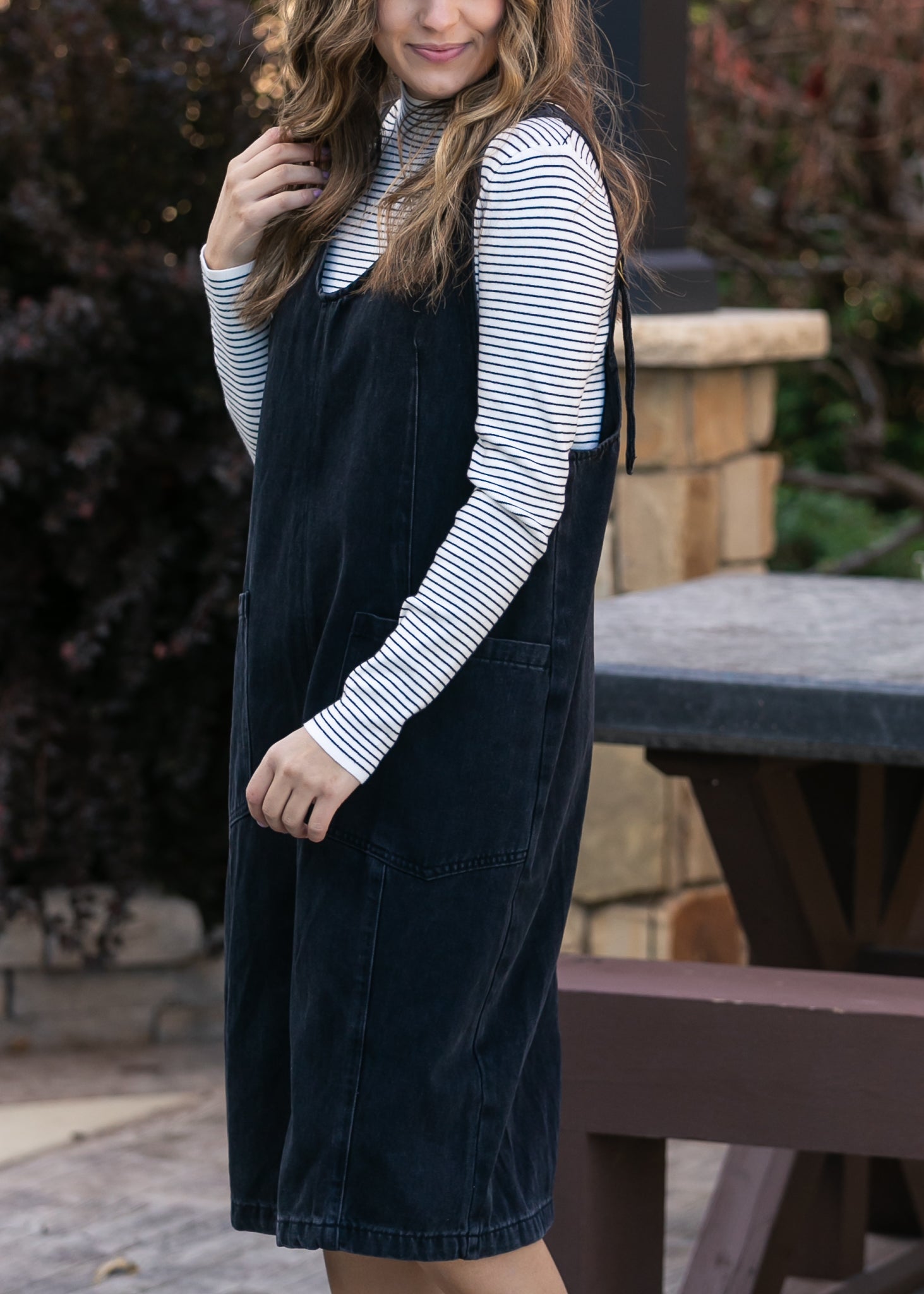black denim dress with white shirt This black denim dress is a dream! We also have the white lace undershirt! Come see us today or shop online!