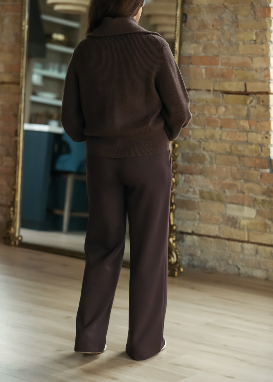 Back view of Coffee Bean Varley wide-leg pants showing the full-length relaxed silhouette.