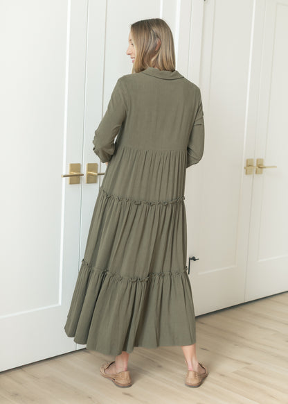 Back of olive Elsie midi dress showing the relaxed tiered skirt and half sleeves.