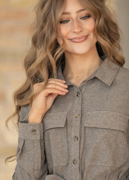 Close-up of collar detail of brown chambray dress.