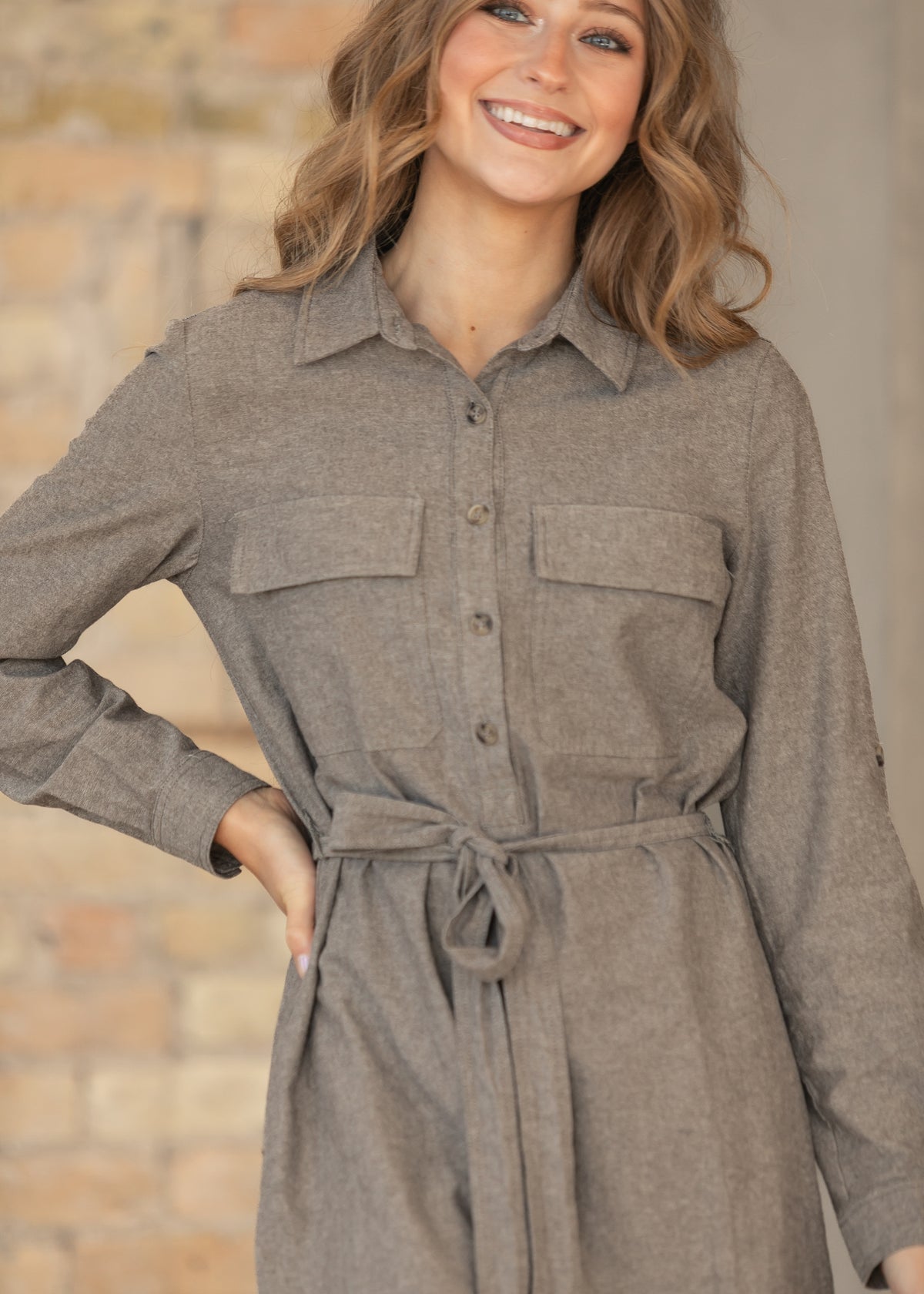 Close-up of tie belt of brown chambray dress.