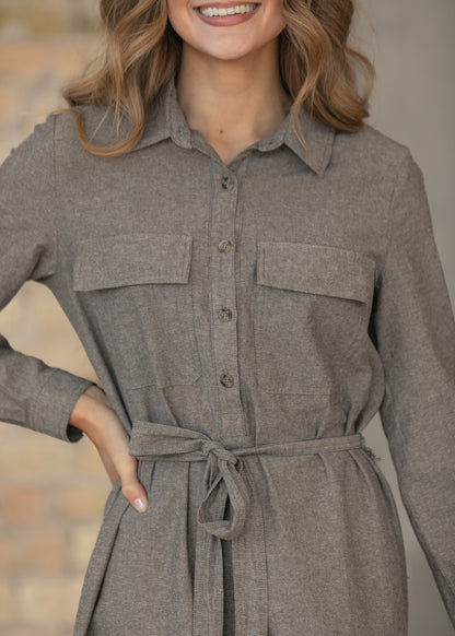 Close-up of button bodice of brown chambray dress.