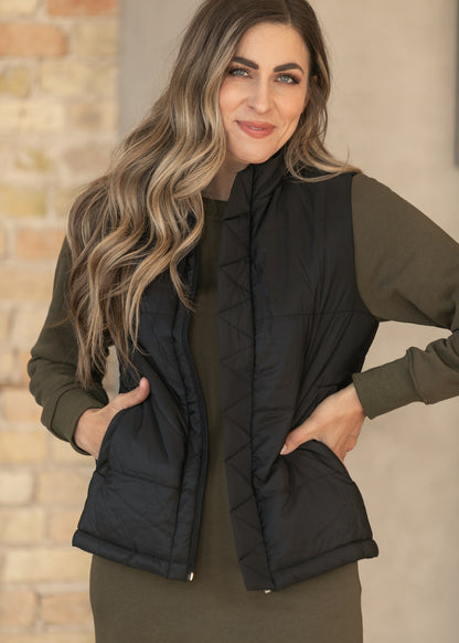 Close-up of the Polar Black Puff Vest Short with zip front and stand collar.