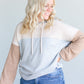 A colorblocked lightweight hoodie with ribbed texture.