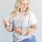 A colorblocked lightweight hoodie with ribbed texture.
