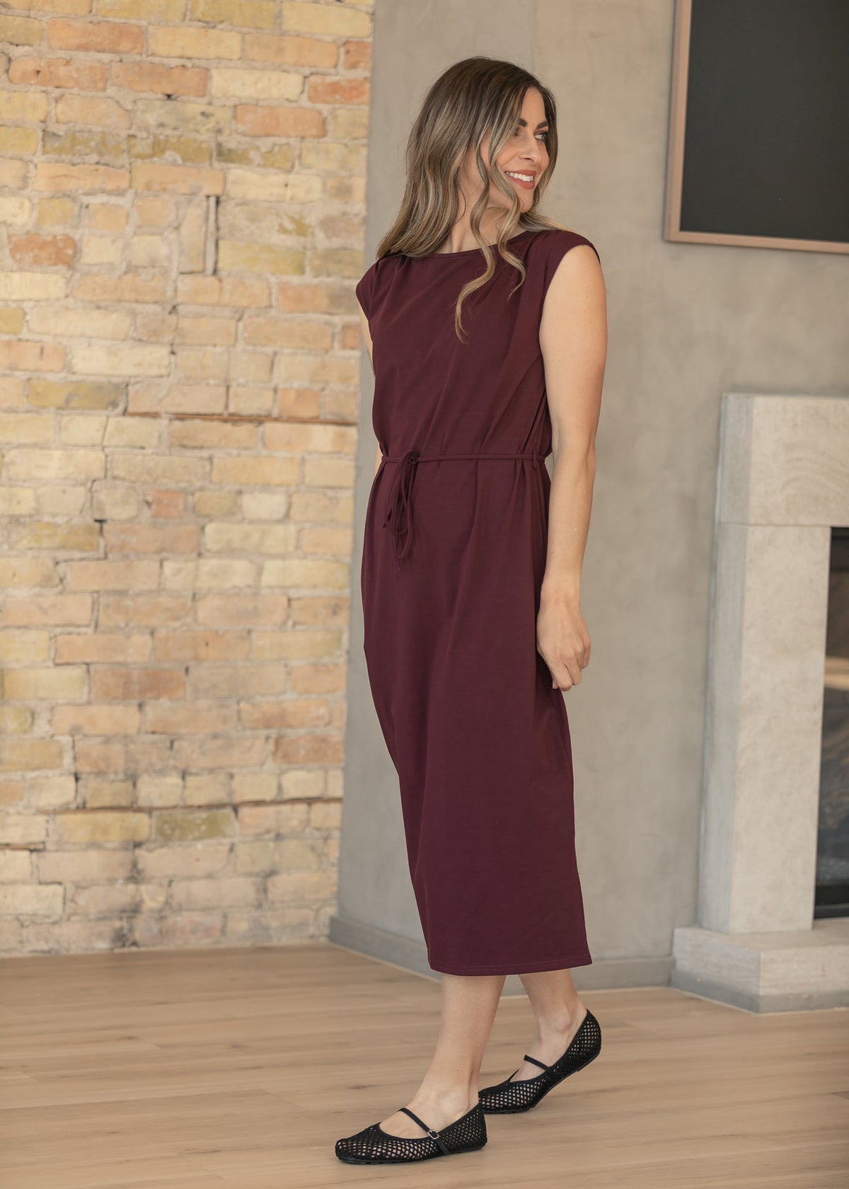 Mulberry Romy dress showing shoulder pleats, cap sleeves, and a narrow matching waist tie.