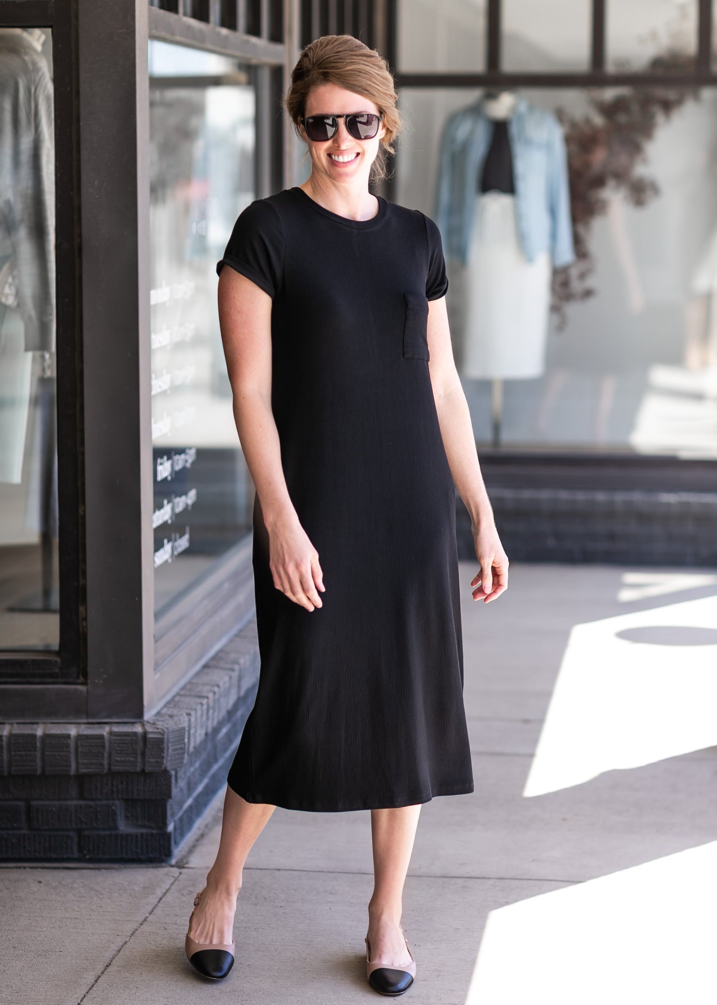 A modest fit, ribbed t-shirt midi dress in black or tan. 