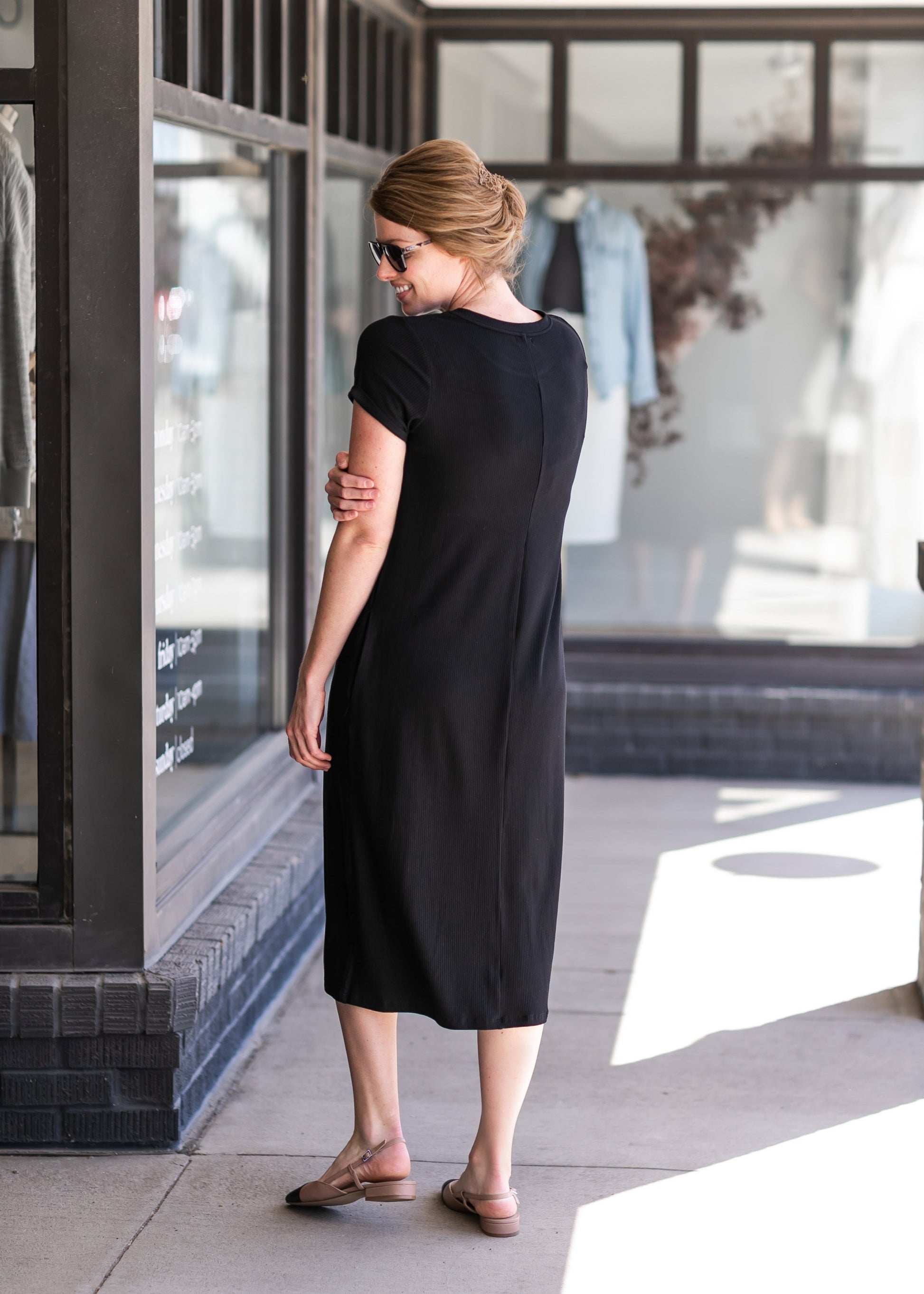 Finley Ribbed Midi Dress A modest fit, ribbed t-shirt midi dress in black or tan. 