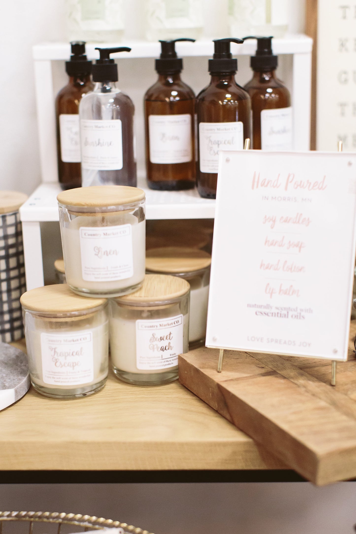 hand poured soy candles in a clear jar with bamboo lid